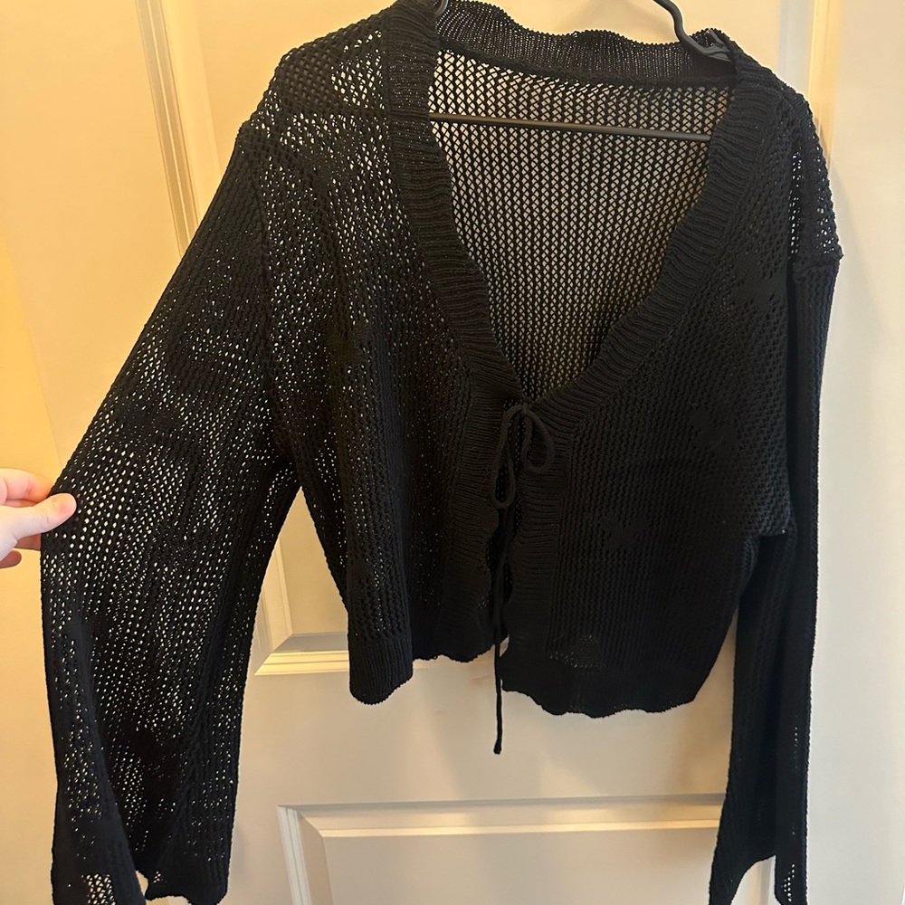 Cider knit shrug with tie front and bow details